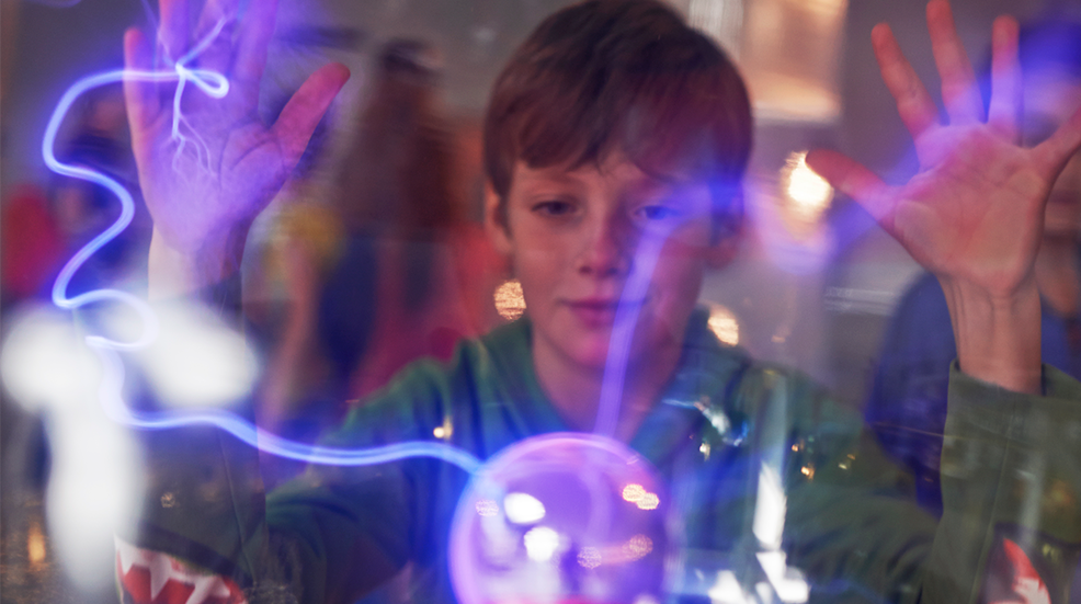Schoolboy in a technology museum 